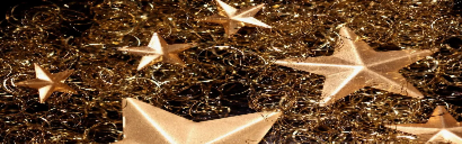 Gold tinsel and gold star ornaments